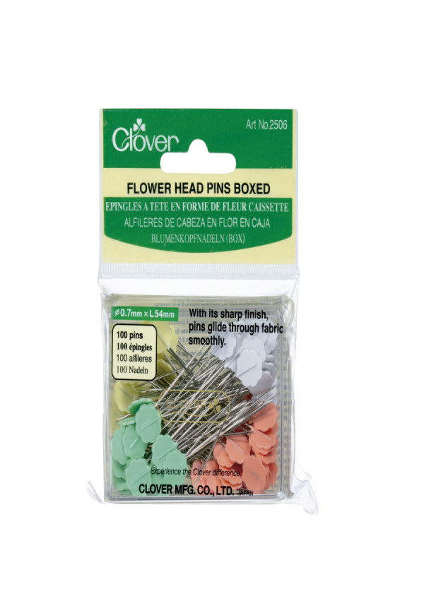 Alfileres de cabeza en flor en caja